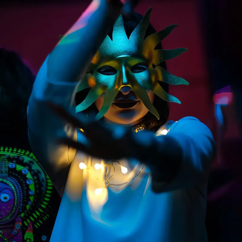 Masked performer at a Transcendental Spirit event